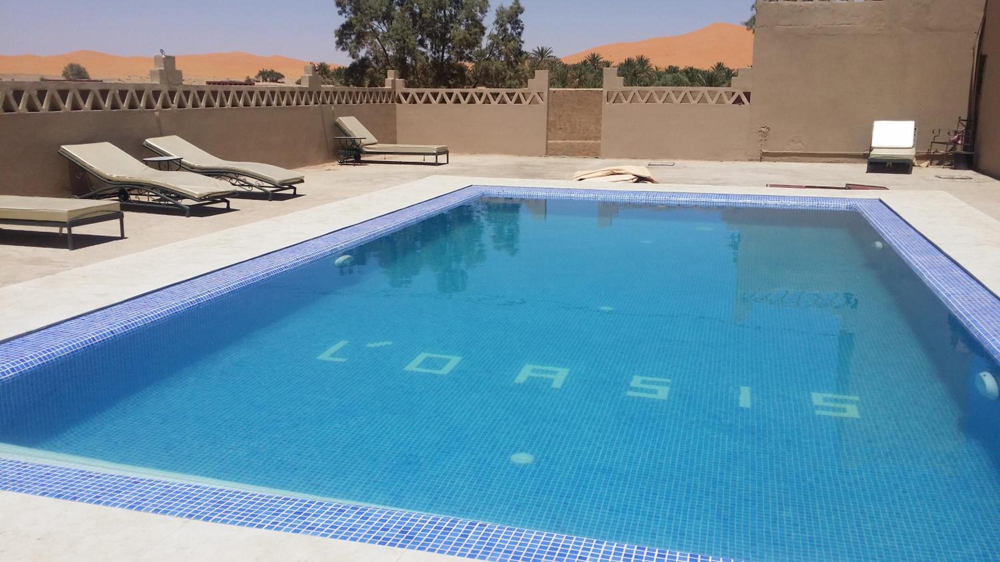Hotel Riad Oasis Мерцуга Екстериор снимка